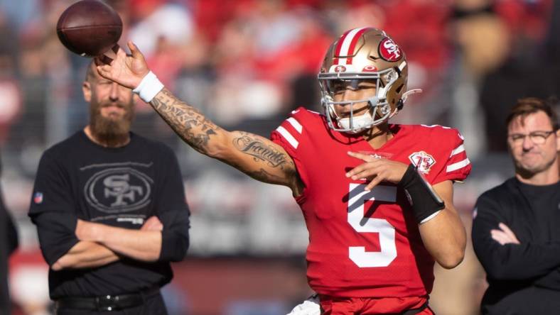 Jan 2, 2022; Santa Clara, California, USA;  San Francisco 49ers quarterback Trey Lance (5) throws the ball during warm ups against the Houston Texans at Levi's Stadium. Mandatory Credit: Stan Szeto-USA TODAY Sports