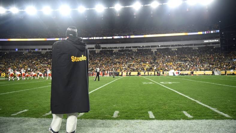 Jan 3, 2022; Pittsburgh, Pennsylvania, USA;  Pittsburgh Steelers quarterback Ben Roethlisberger (7) watches the game against the Cleveland Browns from the sidelines during the third quarter at Heinz Field. Mandatory Credit: Philip G. Pavely-USA TODAY Sports