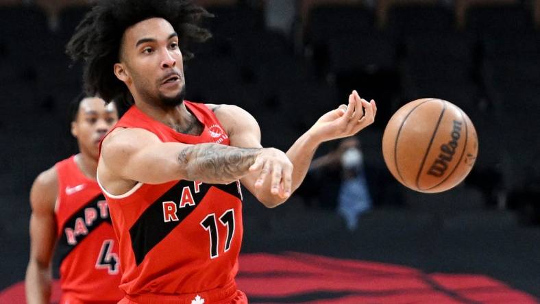 Jan 23, 2022; Toronto, Ontario, CAN;  Toronto Raptors forward Justin Champagnie (11) passes the ball against Portland Trail Blazers in the second half at Scotiabank Arena. Mandatory Credit: Dan Hamilton-USA TODAY Sports