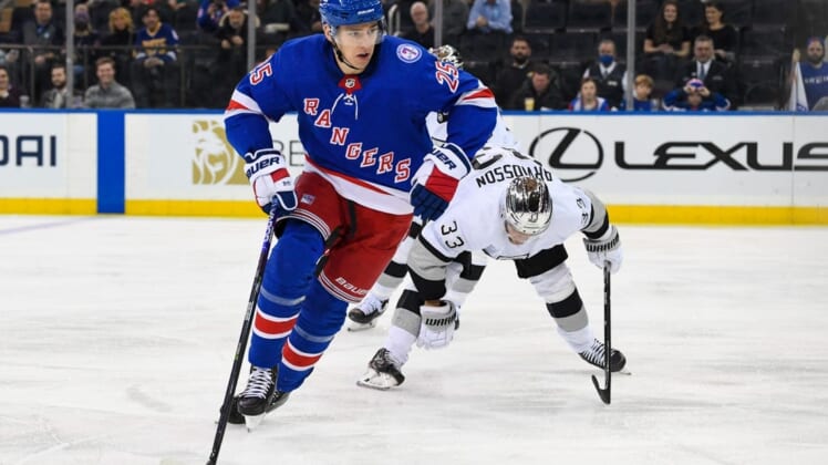 Jan 24, 2022; New York, New York, USA;  New York Rangers defenseman Libor Hajek (25) skates with the puck against the Los Angeles Kings during the third period at Madison Square Garden. Mandatory Credit: Dennis Schneidler-USA TODAY Sports