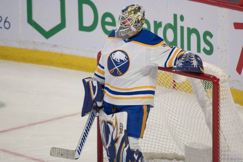 Jan 25, 2022; Ottawa, Ontario, CAN; Buffalo Sabres goalie Aaron Dell (80) looks on during a pause in play in the third period against the Ottawa Senators at the Canadian Tire Centre. Mandatory Credit: Marc DesRosiers-USA TODAY Sports