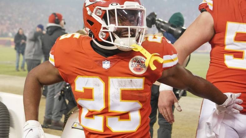 Jan 23, 2022; Kansas City, Missouri, USA; Kansas City Chiefs running back Clyde Edwards-Helaire (25) celebrates while leaving the field after the win over the Buffalo Bills during an AFC Divisional playoff football game at GEHA Field at Arrowhead Stadium. Mandatory Credit: Denny Medley-USA TODAY Sports