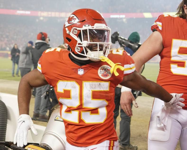 Jan 23, 2022; Kansas City, Missouri, USA; Kansas City Chiefs running back Clyde Edwards-Helaire (25) celebrates while leaving the field after the win over the Buffalo Bills during an AFC Divisional playoff football game at GEHA Field at Arrowhead Stadium. Mandatory Credit: Denny Medley-USA TODAY Sports