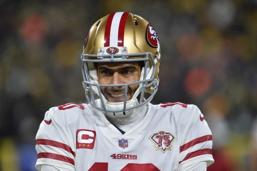 Jan 22, 2022; Green Bay, Wisconsin, USA; San Francisco 49ers quarterback Jimmy Garoppolo (10) in action against the Green Bay Packers during a NFC Divisional playoff football game at Lambeau Field. Mandatory Credit: Jeffrey Becker-USA TODAY Sports