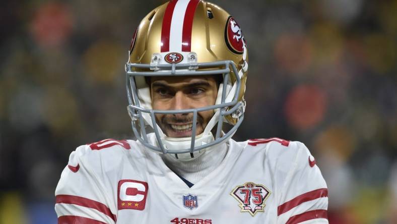 Jan 22, 2022; Green Bay, Wisconsin, USA; San Francisco 49ers quarterback Jimmy Garoppolo (10) in action against the Green Bay Packers during a NFC Divisional playoff football game at Lambeau Field. Mandatory Credit: Jeffrey Becker-USA TODAY Sports