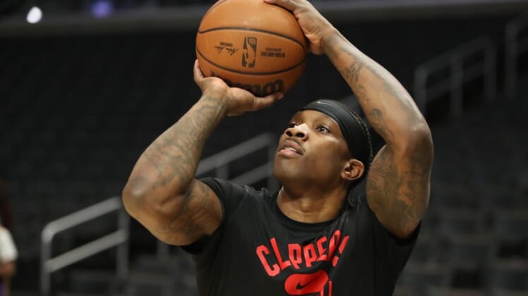 Feb 3, 2022; Los Angeles, California, USA; Los Angeles Clippers guard Eric Bledsoe (12) warms up before the game against the Los Angeles Lakers at Crypto.com Arena. Mandatory Credit: Kiyoshi Mio-USA TODAY Sports