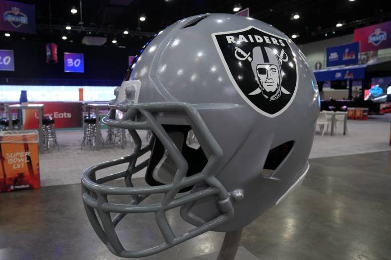 Feb 9, 2022; Los Angeles, CA, USA; A Las Vegas Raiders helmet is seen at the Super Bowl LVI Experience at the Los Angeles Convention Center. Mandatory Credit: Kirby Lee-USA TODAY Sports