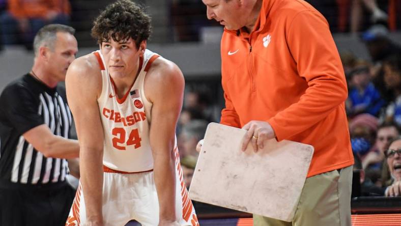 Clemson sophomore center PJ Hall(24) listens to Clemson Head Coach Brad Brownell during the second half at Littlejohn Coliseum Thursday, February 10, 2022.

Ncaa Basketball Duke At Clemson