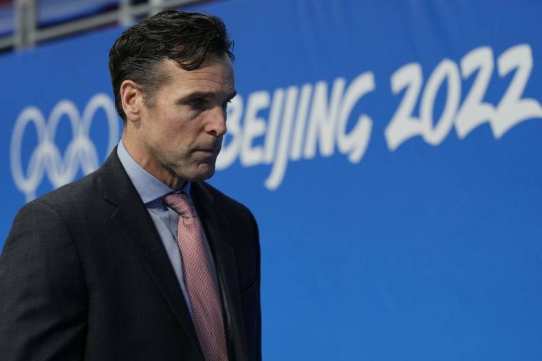 Feb 13, 2022; Beijing, China; Team United States head coach David Quinn leaves the bench at the end of the second period against Team Germany during the Beijing 2022 Olympic Winter Games at Wukesong Sports Centre. Mandatory Credit: George Walker IV-USA TODAY Sports