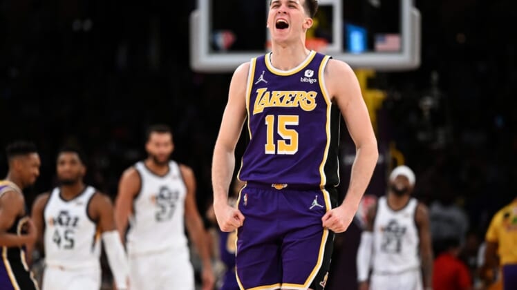 Feb 16, 2022; Los Angeles, California, USA; Los Angeles Lakers guard Austin Reaves (15) celebrates after making a three-point basket in the final seconds against the Utah Jazz at Crypto.com Arena. Mandatory Credit: Jayne Kamin-Oncea-USA TODAY Sports