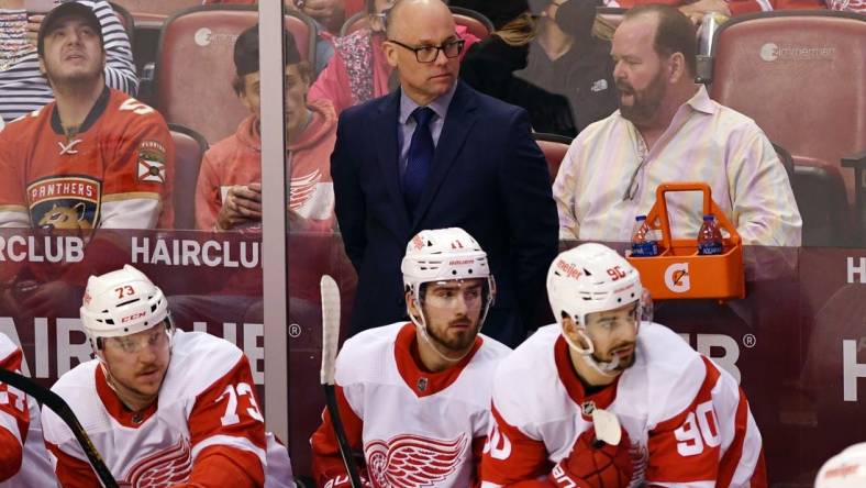 Mar 5, 2022; Sunrise, Florida, USA; Detroit Red Wings head coach Jeff Blashill looks on during the second period against the Florida Panthers at FLA Live Arena. Mandatory Credit: Jim Rassol-USA TODAY Sports