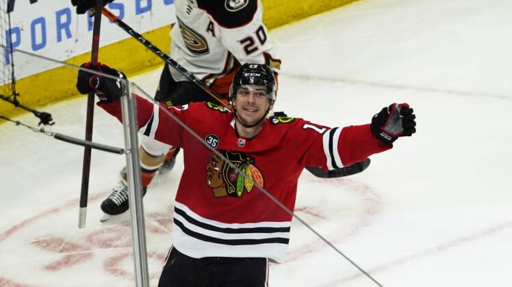 Mar 8, 2022; Chicago, Illinois, USA; Chicago Blackhawks center Dylan Strome (17) celebrates his third goal of the game against the Anaheim Ducks during the third period at United Center. Mandatory Credit: David Banks-USA TODAY Sports
