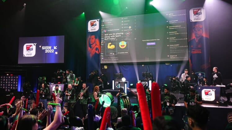 A crowd full of Austin FC fans cheered for Austin FC's eMLS player, John Garcia, during the eMLS Cup tournament at the Moody Theater on March 13, 2022. The eMLS Cup is the championship tournament that determines which player is the best FIFA esports player in North America.Aem Sxsw Emls Cup 16