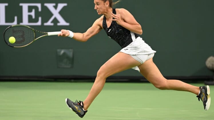 Mar 14, 2022; Indian Wells, CA, USA; Sara Sorribes Tormo (ESP) hits a shot in her third round match against Paula Badosa (not pictured) during the BNP Paribas Open at the Indian Wells Tennis Garden. Mandatory Credit: Jayne Kamin-Oncea-USA TODAY Sports
