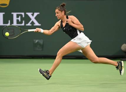 Mar 14, 2022; Indian Wells, CA, USA; Sara Sorribes Tormo (ESP) hits a shot in her third round match against Paula Badosa (not pictured) during the BNP Paribas Open at the Indian Wells Tennis Garden. Mandatory Credit: Jayne Kamin-Oncea-USA TODAY Sports