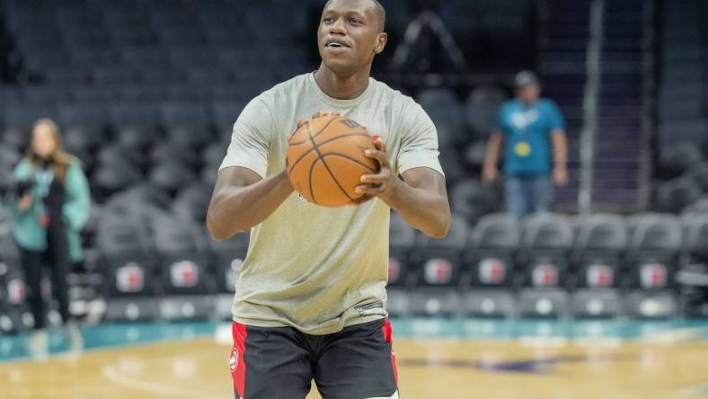 Mar 16, 2022; Charlotte, North Carolina, USA; Atlanta Hawks center Gorgui Dieng (10) during pregame warm ups before the game between the Charlotte Hornets and the Atlanta Hawks at the Spectrum Center. Mandatory Credit: Jim Dedmon-USA TODAY Sports