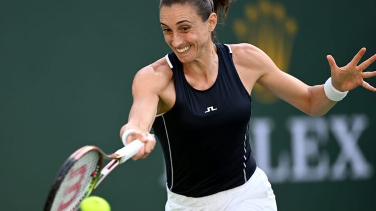 Mar 16, 2022; Indian Wells, CA, USA;  Petra Martic (CRO) hits a shot in her quarterfinal match against Simona Halep (ROM) at the BNP Paribas Open at the Indian Wells Tennis Garden. Mandatory Credit: Jayne Kamin-Oncea-USA TODAY Sports