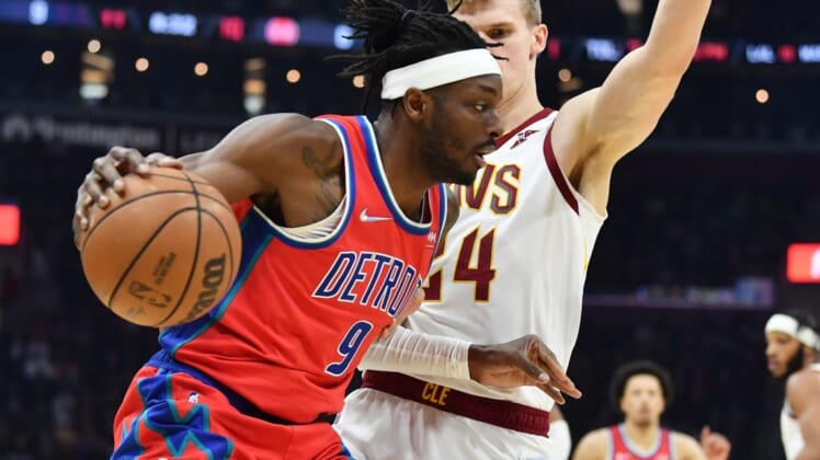 Mar 19, 2022; Cleveland, Ohio, USA; Detroit Pistons forward Jerami Grant (9) drives to the basket against Cleveland Cavaliers forward Lauri Markkanen (24) during the first quarter at Rocket Mortgage FieldHouse. Mandatory Credit: Ken Blaze-USA TODAY Sports