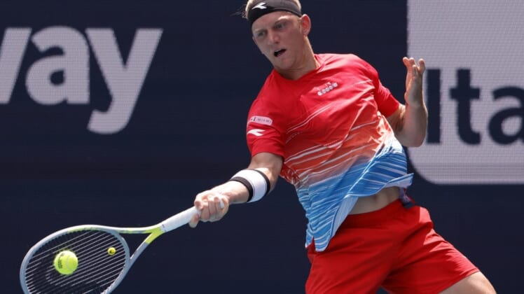 Mar 24, 2022; Miami Gardens, FL, USA; Alejandro Davidovich Fokina (ESP) hits a forehand against Sebastian Korda (USA) (not pictured) in a first round men's singles match in the Miami Open at Hard Rock Stadium. Mandatory Credit: Geoff Burke-USA TODAY Sports