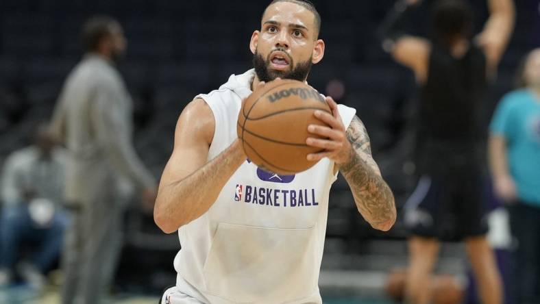 Apr 7, 2022; Charlotte, North Carolina, USA; Charlotte Hornets forward Cody Martin (11) during pregame warm ups against the Orlando Magic at Spectrum Center. Mandatory Credit: Jim Dedmon-USA TODAY Sports