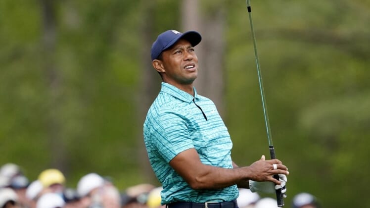 Apr 8, 2022; Augusta, Georgia, USA; Tiger Woods watches his tee shot from no. 12 during the second round of The Masters golf tournament at Augusta National Golf Course. Mandatory Credit: Danielle Parhizkaran-Augusta Chronicle/USA TODAY Sports