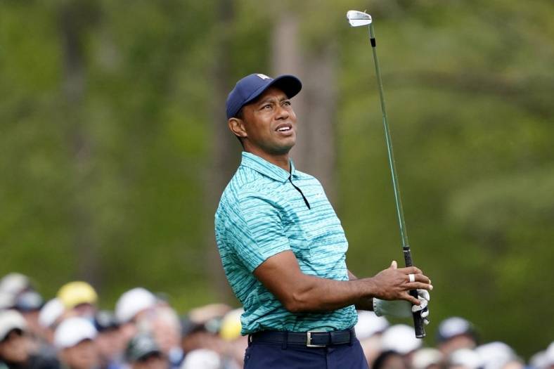 Apr 8, 2022; Augusta, Georgia, USA; Tiger Woods watches his tee shot from no. 12 during the second round of The Masters golf tournament at Augusta National Golf Course. Mandatory Credit: Danielle Parhizkaran-Augusta Chronicle/USA TODAY Sports