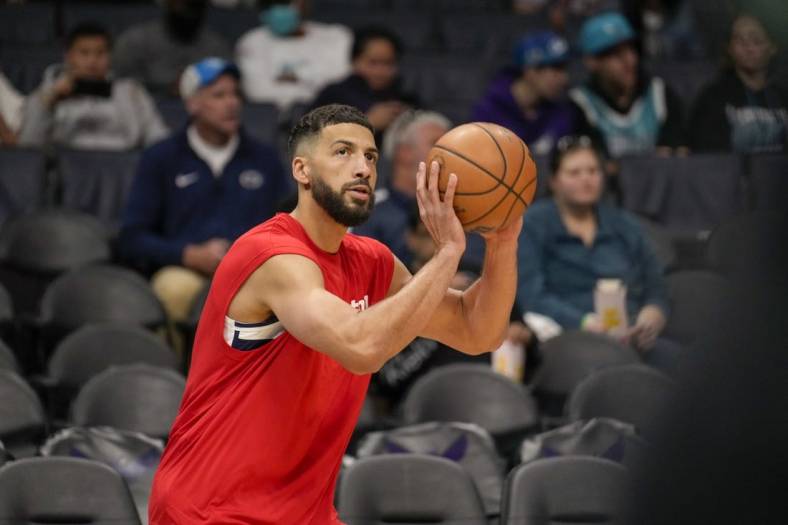 Apr 10, 2022; Charlotte, North Carolina, USA; Washington Wizards forward Anthony Gill (16) warms up during the first quarter against the Charlotte Hornets at Spectrum Center. Mandatory Credit: Jim Dedmon-USA TODAY Sports