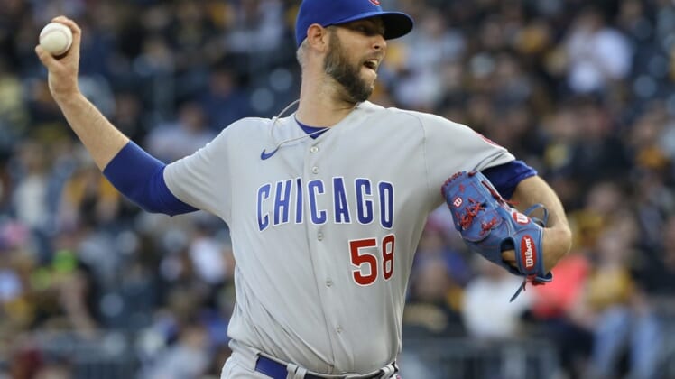 Apr 12, 2022; Pittsburgh, Pennsylvania, USA;  Chicago Cubs relief pitcher Chris Martin (58) pitches against the Pittsburgh Pirates during the sixth inning at PNC Park. Mandatory Credit: Charles LeClaire-USA TODAY Sports