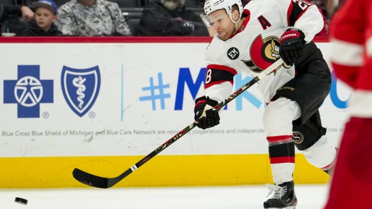 Apr 12, 2022; Detroit, Michigan, USA; Ottawa Senators right wing Connor Brown (28) takes a shot during the third period against the Detroit Red Wings at Little Caesars Arena. Mandatory Credit: Raj Mehta-USA TODAY Sports