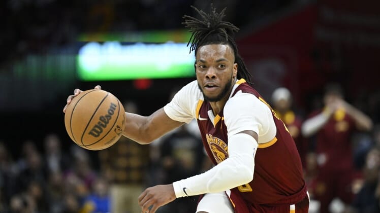 Apr 15, 2022; Cleveland, Ohio, USA; Cleveland Cavaliers guard Darius Garland (10) dribbles the ball in the third quarter against the Atlanta Hawks at Rocket Mortgage FieldHouse. Mandatory Credit: David Richard-USA TODAY Sports