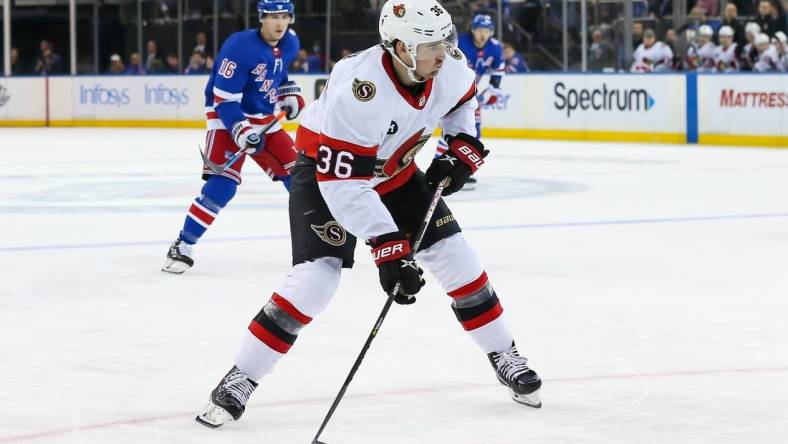 Apr 9, 2022; New York, New York, USA; Ottawa Senators center Colin White (36) controls the puck against New York Rangers during the third period at Madison Square Garden. Mandatory Credit: Tom Horak-USA TODAY Sports