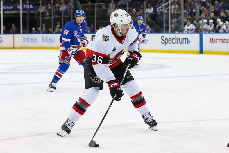 Apr 9, 2022; New York, New York, USA; Ottawa Senators center Colin White (36) controls the puck against New York Rangers during the third period at Madison Square Garden. Mandatory Credit: Tom Horak-USA TODAY Sports