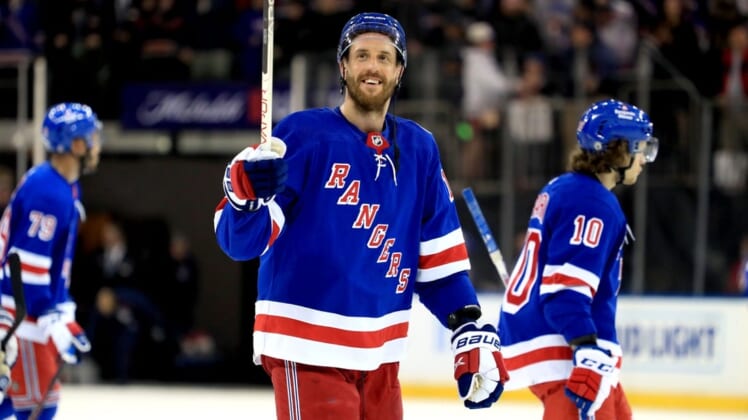 Apr 16, 2022; New York, New York, USA; New York Rangers defenseman Patrik Nemeth (12) smiles at fans after a 4-0 win against the Detroit Red Wings at Madison Square Garden. Mandatory Credit: Danny Wild-USA TODAY Sports
