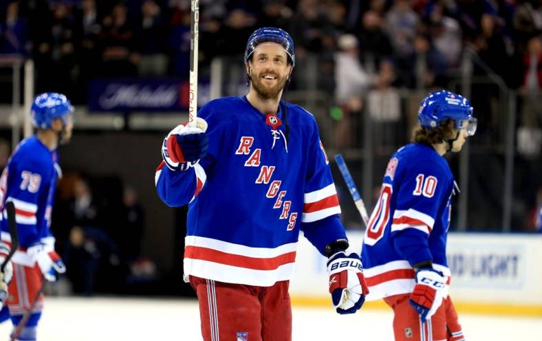 Apr 16, 2022; New York, New York, USA; New York Rangers defenseman Patrik Nemeth (12) smiles at fans after a 4-0 win against the Detroit Red Wings at Madison Square Garden. Mandatory Credit: Danny Wild-USA TODAY Sports