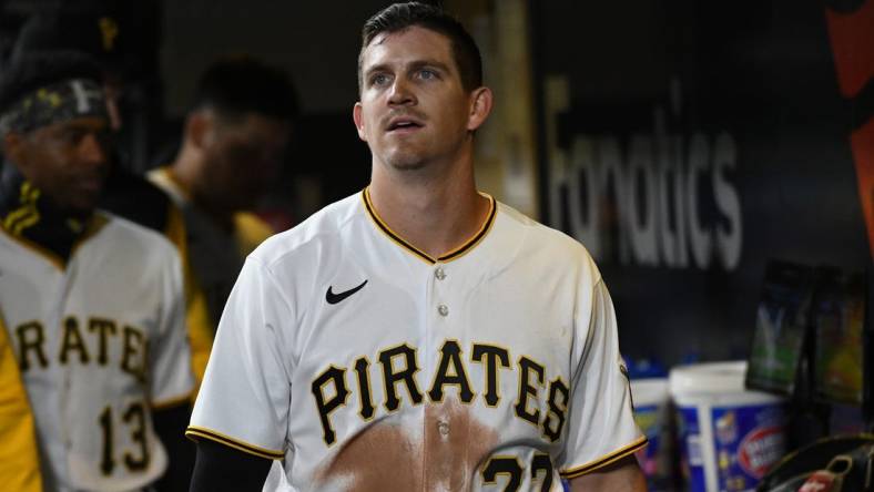 Apr 14, 2022; Pittsburgh, Pennsylvania, USA;  Pittsburgh Pirates player Kevin Newman (27) watches a replay against the Washington Nationals at PNC Park. Mandatory Credit: Philip G. Pavely-USA TODAY Sports