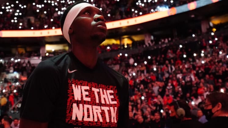 Apr 20, 2022; Toronto, Ontario, CAN; Toronto Raptors forward Chris Boucher (25) during the player introductions before the start of game three of the first round for the 2022 NBA playoffs against the Philadelphia 76ers at Scotiabank Arena. Mandatory Credit: John E. Sokolowski-USA TODAY Sports