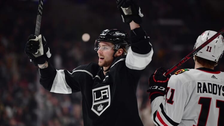 Apr 21, 2022; Los Angeles, California, USA; Los Angeles Kings center Adrian Kempe (9) celebrates the goal scored by center Anze Kopitar (11) against the Chicago Blackhawks during the second period at Crypto.com Arena.  Kempe provided an assist on the goal. Mandatory Credit: Gary A. Vasquez-USA TODAY Sports