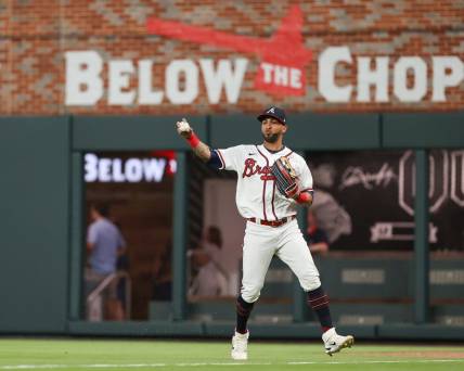 Apr 22, 2022; Cumberland, Georgia, USA; Atlanta Braves left fielder Eddie Rosario (8) catches a ball to force out Miami Marlins shortstop Miguel Rojas (not pictured) during the ninth inning at Truist Park. Mandatory Credit: Mackenzie Lynn Miles-USA TODAY Sports