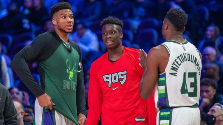 February 19, 2022; Cleveland, OH, USA; Team Antetokounmpo player Giannis Antetokounmpo of the Milwaukee Bucks (34), Team Antetokounmpo player Alex Antetokounmpo of the Raptors 905 of the NBA G League (29), Team Antetokounmpo player Thanasis Antetokounmpo of the Milwaukee Bucks (43) during the Skills Challenge during the 2022 NBA All-Star Saturday Night at Rocket Mortgage Field House. Mandatory Credit: Kyle Terada-USA TODAY Sports