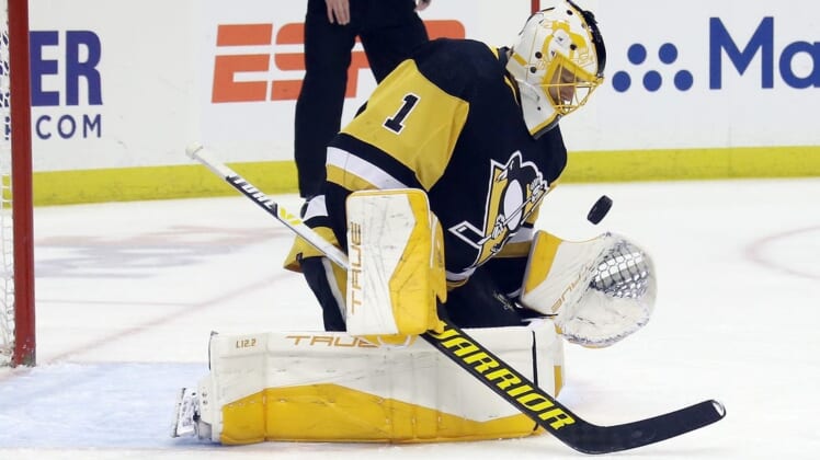 Apr 26, 2022; Pittsburgh, Pennsylvania, USA; Pittsburgh Penguins goaltender Casey DeSmith (1) makes a save against the Edmonton Oilers during the first period at PPG Paints Arena. Mandatory Credit: Charles LeClaire-USA TODAY Sports