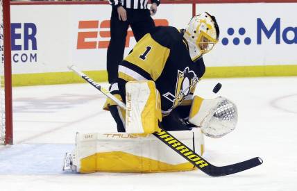 Apr 26, 2022; Pittsburgh, Pennsylvania, USA; Pittsburgh Penguins goaltender Casey DeSmith (1) makes a save against the Edmonton Oilers during the first period at PPG Paints Arena. Mandatory Credit: Charles LeClaire-USA TODAY Sports