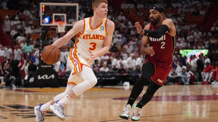 Apr 26, 2022; Miami, Florida, USA; Atlanta Hawks guard Kevin Huerter (3) drives the ball around Miami Heat guard Gabe Vincent (2) during the second half in game five of the first round for the 2022 NBA playoffs at FTX Arena. Mandatory Credit: Jasen Vinlove-USA TODAY Sports