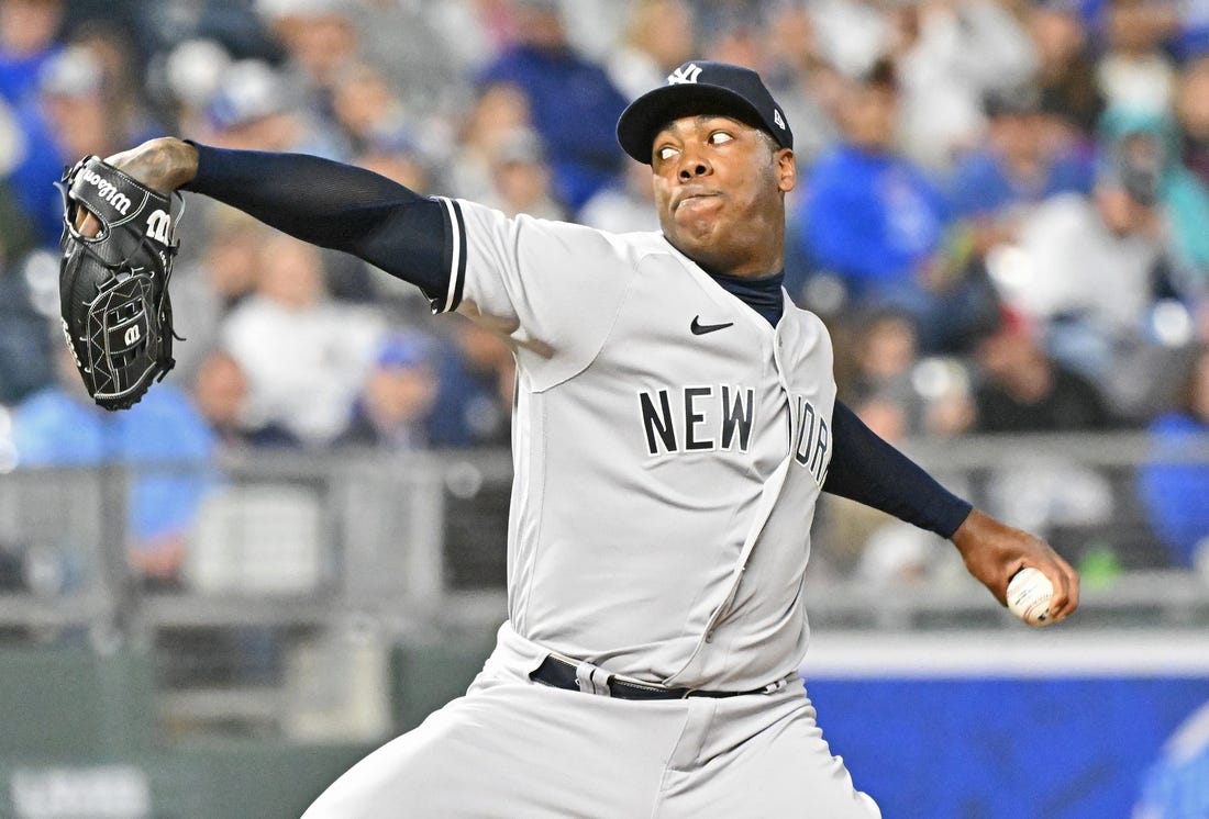 Apr 30, 2022; Kansas City, Missouri, USA;  New York Yankees relief pitcher Aroldis Chapman (54) delivers a pitch during the ninth inning against the Kansas City Royals at Kauffman Stadium. Mandatory Credit: Peter Aiken-USA TODAY Sports