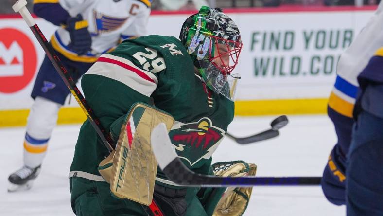 May 2, 2022; Saint Paul, Minnesota, USA; Minnesota Wild goaltender Marc-Andre Fleury (29) makes a save against the St. Louis Blues in the first period in game one of the first round of the 2022 Stanley Cup Playoffs at Xcel Energy Center. Mandatory Credit: Brad Rempel-USA TODAY Sports