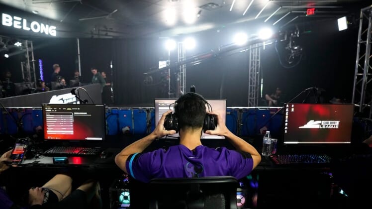 Dillon "Attach" Price of Minnesota R  KKR adjusts his headphones prior to the matchup against OpTic Texas during the Call of Duty League Pro-Am Classic esports tournament at Belong Gaming Arena in Columbus on May 6, 2022.Call Of Duty Esports Tournament