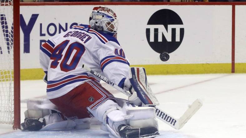 May 7, 2022; Pittsburgh, Pennsylvania, USA;  New York Rangers goaltender Alexandar Georgiev (40) makes a save against the Pittsburgh Penguins during the second period in game three of the first round of the 2022 Stanley Cup Playoffs at PPG Paints Arena.  The Penguins won 7-4. Mandatory Credit: Charles LeClaire-USA TODAY Sports