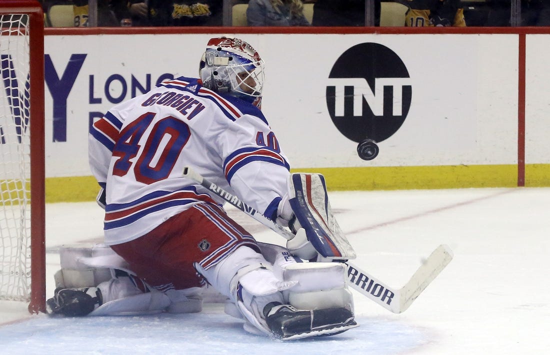 May 7, 2022; Pittsburgh, Pennsylvania, USA;  New York Rangers goaltender Alexandar Georgiev (40) makes a save against the Pittsburgh Penguins during the second period in game three of the first round of the 2022 Stanley Cup Playoffs at PPG Paints Arena.  The Penguins won 7-4. Mandatory Credit: Charles LeClaire-USA TODAY Sports