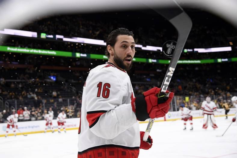 May 8, 2022; Boston, Massachusetts, USA; Carolina Hurricanes center Vincent Trocheck (16) juggles the puck with his stick during warmups prior to game four of the first round of the 2022 Stanley Cup Playoffs against the Boston Bruins at TD Garden. Mandatory Credit: Bob DeChiara-USA TODAY Sports