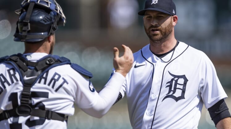 May 10, 2022; Detroit, Michigan, USA; Detroit Tigers starting pitcher Drew Hutchison (40) celebrates with catcher Tucker Barnhart (15) after the game against the Oakland Athletics at Comerica Park. Mandatory Credit: Raj Mehta-USA TODAY Sports