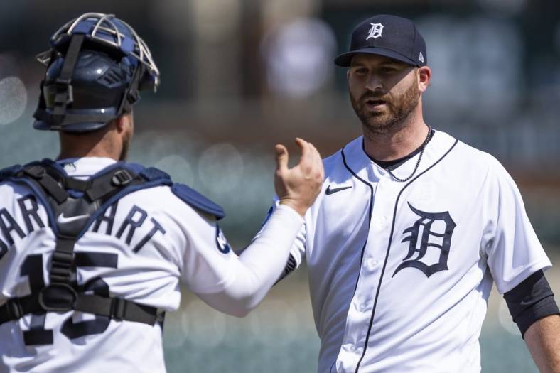 May 10, 2022; Detroit, Michigan, USA; Detroit Tigers starting pitcher Drew Hutchison (40) celebrates with catcher Tucker Barnhart (15) after the game against the Oakland Athletics at Comerica Park. Mandatory Credit: Raj Mehta-USA TODAY Sports